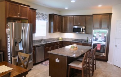 Charming 4-Bedroom Home on the 17th Hole in Arlington Ridge - on Arlington Ridge Golf Club in Florida - for sale on GolfHomes.com, golf home, golf lot