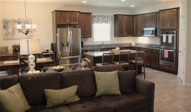 Charming 4-Bedroom Home on the 17th Hole in Arlington Ridge - on Arlington Ridge Golf Club in Florida - for sale on GolfHomes.com, golf home, golf lot