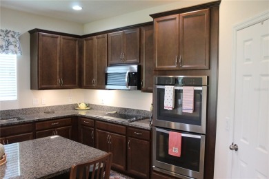 Charming 4-Bedroom Home on the 17th Hole in Arlington Ridge - on Arlington Ridge Golf Club in Florida - for sale on GolfHomes.com, golf home, golf lot