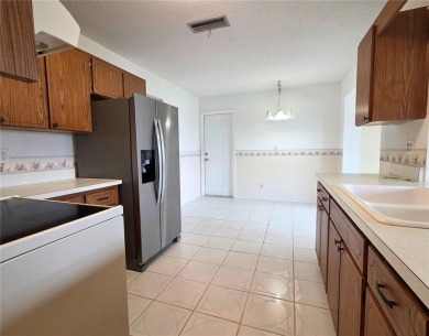Welcome to this amazing 2-bedroom, 2-bath home, perfectly on Mainlands Golf Club in Florida - for sale on GolfHomes.com, golf home, golf lot