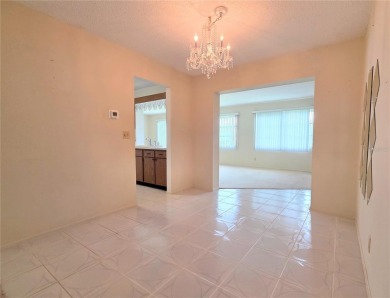Welcome to this amazing 2-bedroom, 2-bath home, perfectly on Mainlands Golf Club in Florida - for sale on GolfHomes.com, golf home, golf lot