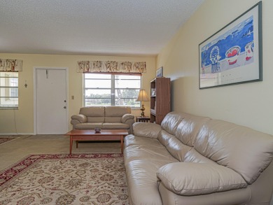 Turn-key 1BR/1.5BA in Vista Royale, Vero's most active 55+ on The American Golf Club in Florida - for sale on GolfHomes.com, golf home, golf lot