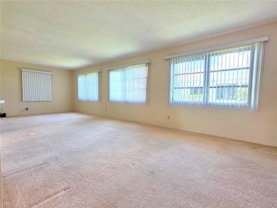 Welcome to this amazing 2-bedroom, 2-bath home, perfectly on Mainlands Golf Club in Florida - for sale on GolfHomes.com, golf home, golf lot