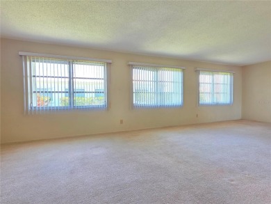 Welcome to this amazing 2-bedroom, 2-bath home, perfectly on Mainlands Golf Club in Florida - for sale on GolfHomes.com, golf home, golf lot