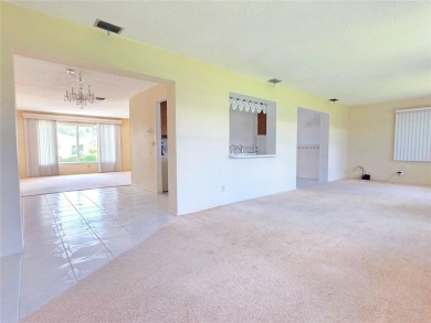 Welcome to this amazing 2-bedroom, 2-bath home, perfectly on Mainlands Golf Club in Florida - for sale on GolfHomes.com, golf home, golf lot
