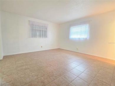 Welcome to this amazing 2-bedroom, 2-bath home, perfectly on Mainlands Golf Club in Florida - for sale on GolfHomes.com, golf home, golf lot