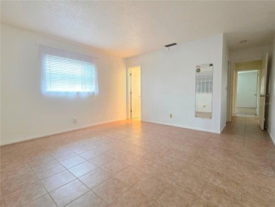 Welcome to this amazing 2-bedroom, 2-bath home, perfectly on Mainlands Golf Club in Florida - for sale on GolfHomes.com, golf home, golf lot