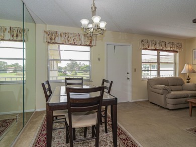 Turn-key 1BR/1.5BA in Vista Royale, Vero's most active 55+ on The American Golf Club in Florida - for sale on GolfHomes.com, golf home, golf lot