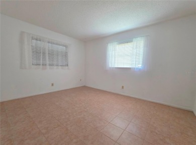 Welcome to this amazing 2-bedroom, 2-bath home, perfectly on Mainlands Golf Club in Florida - for sale on GolfHomes.com, golf home, golf lot