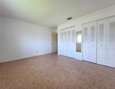 Welcome to this amazing 2-bedroom, 2-bath home, perfectly on Mainlands Golf Club in Florida - for sale on GolfHomes.com, golf home, golf lot