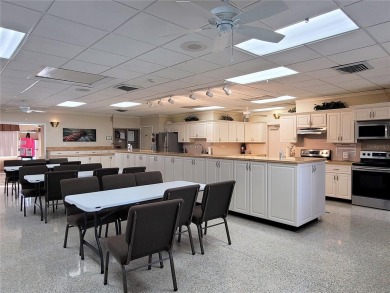 Welcome to this amazing 2-bedroom, 2-bath home, perfectly on Mainlands Golf Club in Florida - for sale on GolfHomes.com, golf home, golf lot