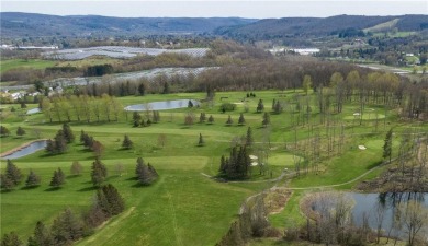 Scenic one acre building lot overlooking beautiful Canasawacta on Canasawacta Golf and Country Club in New York - for sale on GolfHomes.com, golf home, golf lot