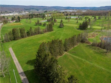 Scenic one acre building lot overlooking beautiful Canasawacta on Canasawacta Golf and Country Club in New York - for sale on GolfHomes.com, golf home, golf lot