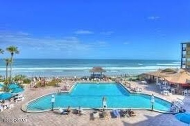 INVESTMENT OPPORTUNITY HANDICAP ACCESSIBLE! Enjoy your fully on Oceans Golf Club in Florida - for sale on GolfHomes.com, golf home, golf lot