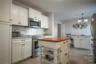 Enjoy low-maintenance living in a beautiful golf course setting on Jennings Mill Country Club in Georgia - for sale on GolfHomes.com, golf home, golf lot