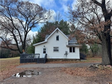 Great location, just outside of town. Walking distance to both on Spooner Golf Club in Wisconsin - for sale on GolfHomes.com, golf home, golf lot