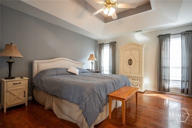 Enjoy low-maintenance living in a beautiful golf course setting on Jennings Mill Country Club in Georgia - for sale on GolfHomes.com, golf home, golf lot