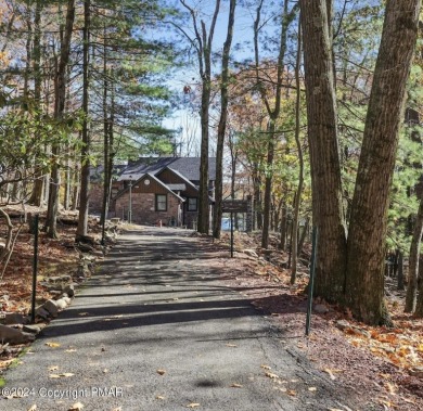 Looking for a one-of-a-kind LAKE house? Come take a look at this on Split Rock Resort and Country Club in Pennsylvania - for sale on GolfHomes.com, golf home, golf lot