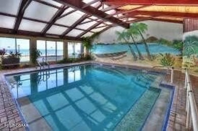 INVESTMENT OPPORTUNITY HANDICAP ACCESSIBLE! Enjoy your fully on Oceans Golf Club in Florida - for sale on GolfHomes.com, golf home, golf lot