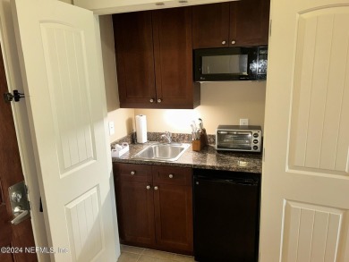 Snow bird or Investors Delight! Luxurious 2 bedroom condo with a on King and Bear Golf Course/World Golf Village in Florida - for sale on GolfHomes.com, golf home, golf lot