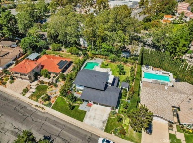 Stunning reimagined contemporary styled home with sleek clean on El Niguel Country Club in California - for sale on GolfHomes.com, golf home, golf lot