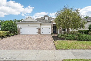 Welcome to this beautifully maintained single-story 4-bedroom on The Palencia Club in Florida - for sale on GolfHomes.com, golf home, golf lot