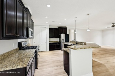 Welcome to this beautifully maintained single-story 4-bedroom on The Palencia Club in Florida - for sale on GolfHomes.com, golf home, golf lot
