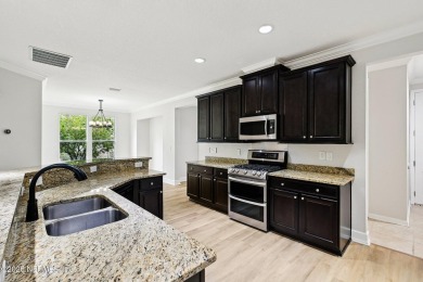 Welcome to this beautifully maintained single-story 4-bedroom on The Palencia Club in Florida - for sale on GolfHomes.com, golf home, golf lot