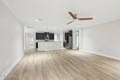 Welcome to this beautifully maintained single-story 4-bedroom on The Palencia Club in Florida - for sale on GolfHomes.com, golf home, golf lot