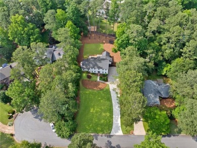 WOW! Don't miss the opportunity to make this fully renovated on Country Club of Roswell in Georgia - for sale on GolfHomes.com, golf home, golf lot
