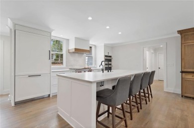 WOW! Don't miss the opportunity to make this fully renovated on Country Club of Roswell in Georgia - for sale on GolfHomes.com, golf home, golf lot