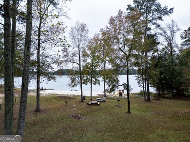 Peace & tranquility while living the lake life! Enjoy the perks on Turtle Cove Golf Course in Georgia - for sale on GolfHomes.com, golf home, golf lot