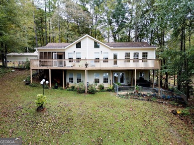 Peace & tranquility while living the lake life! Enjoy the perks on Turtle Cove Golf Course in Georgia - for sale on GolfHomes.com, golf home, golf lot