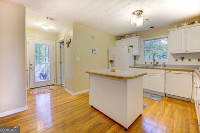 Peace & tranquility while living the lake life! Enjoy the perks on Turtle Cove Golf Course in Georgia - for sale on GolfHomes.com, golf home, golf lot