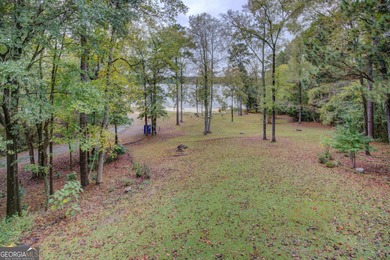 Peace & tranquility while living the lake life! Enjoy the perks on Turtle Cove Golf Course in Georgia - for sale on GolfHomes.com, golf home, golf lot