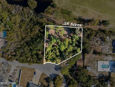 This oversized approximately 0.56-acre homesite on Diana Court on Bay Point Resort Golf Club in Florida - for sale on GolfHomes.com, golf home, golf lot