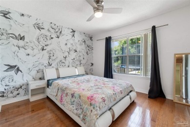 You'll enjoy the best of Florida living in this lovely 4 bedroom on Tiger Point Golf and Country Club in Florida - for sale on GolfHomes.com, golf home, golf lot