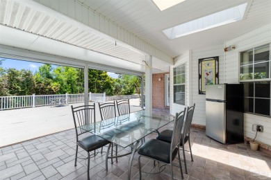 You'll enjoy the best of Florida living in this lovely 4 bedroom on Tiger Point Golf and Country Club in Florida - for sale on GolfHomes.com, golf home, golf lot