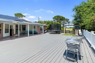 You'll enjoy the best of Florida living in this lovely 4 bedroom on Tiger Point Golf and Country Club in Florida - for sale on GolfHomes.com, golf home, golf lot