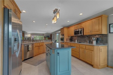 Welcome to this stunning high-end townhome perfectly perched on Majestic Oaks Golf Club  in Minnesota - for sale on GolfHomes.com, golf home, golf lot