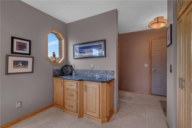Welcome to this stunning high-end townhome perfectly perched on Majestic Oaks Golf Club  in Minnesota - for sale on GolfHomes.com, golf home, golf lot