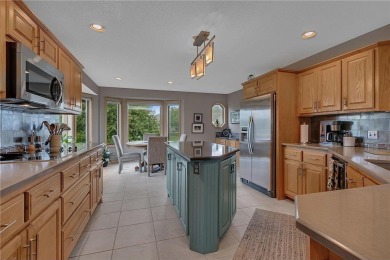 Welcome to this stunning high-end townhome perfectly perched on Majestic Oaks Golf Club  in Minnesota - for sale on GolfHomes.com, golf home, golf lot