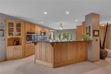 Welcome to this stunning high-end townhome perfectly perched on Majestic Oaks Golf Club  in Minnesota - for sale on GolfHomes.com, golf home, golf lot