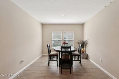 Discover modern sophistication in this popular Tivoli model on Eagle Landing Golf Club in Florida - for sale on GolfHomes.com, golf home, golf lot