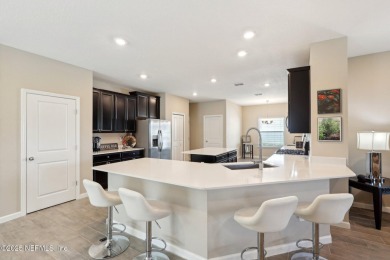 Discover modern sophistication in this popular Tivoli model on Eagle Landing Golf Club in Florida - for sale on GolfHomes.com, golf home, golf lot