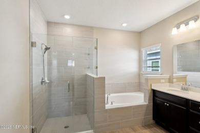 Discover modern sophistication in this popular Tivoli model on Eagle Landing Golf Club in Florida - for sale on GolfHomes.com, golf home, golf lot