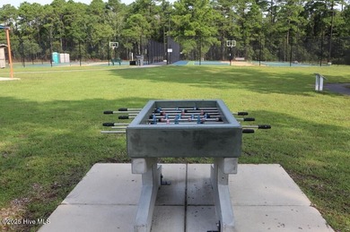 Build your next home on this beautifully situated 0.30-acre on The Lakes Country Club in North Carolina - for sale on GolfHomes.com, golf home, golf lot