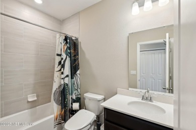 Discover modern sophistication in this popular Tivoli model on Eagle Landing Golf Club in Florida - for sale on GolfHomes.com, golf home, golf lot