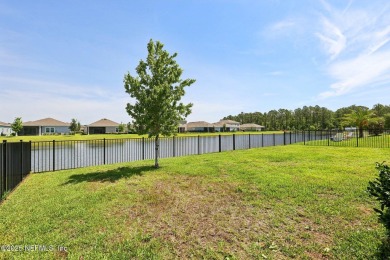 Discover modern sophistication in this popular Tivoli model on Eagle Landing Golf Club in Florida - for sale on GolfHomes.com, golf home, golf lot