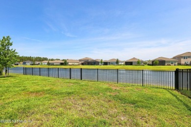 Discover modern sophistication in this popular Tivoli model on Eagle Landing Golf Club in Florida - for sale on GolfHomes.com, golf home, golf lot